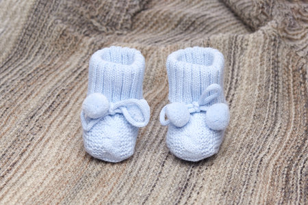 baby booties, for newborns, the first shoes for delicate feetの写真素材