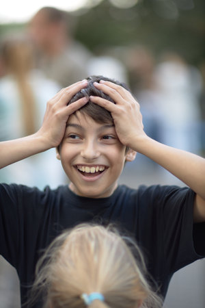 Innocence Lost, A Young Boys Anguish Echoes Through His Tender Fingertipsの写真素材