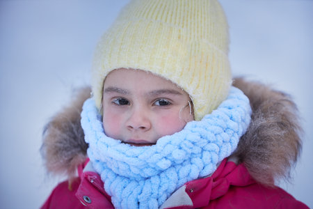 Little Girl Wearing Hat and Scarfの写真素材