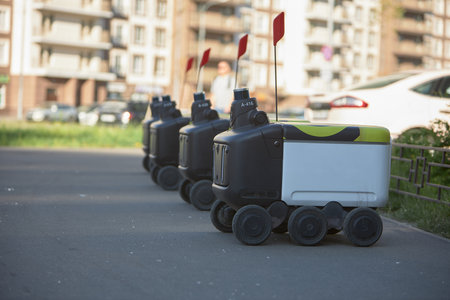 Autonomous delivery robots on city streetsの写真素材