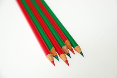 Red and green colored pencilsの写真素材