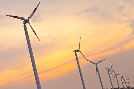 Wind turbines at sunset