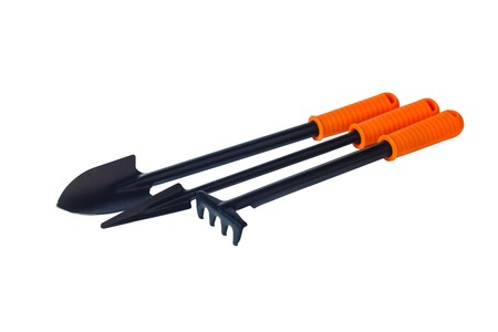 Gardening shovel and rake isolated on a white backgroundの写真素材