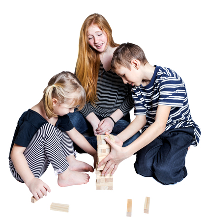 Mama and two kids play together isolated on white backgroundの写真素材