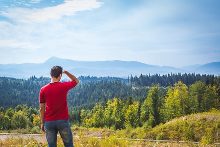 Man on top of mountain. Conceptual scene.の写真素材