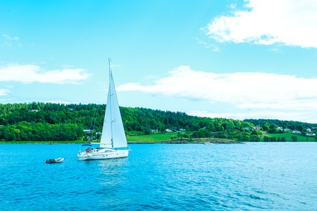 Beautiful sailboat sailing sail North sea ocean horizonの写真素材