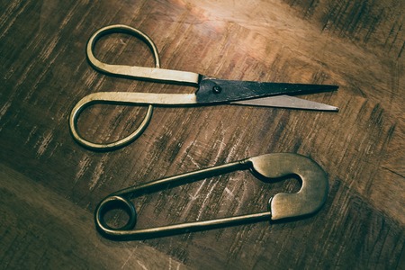 Sewing accessories on wooden table, top viewの写真素材