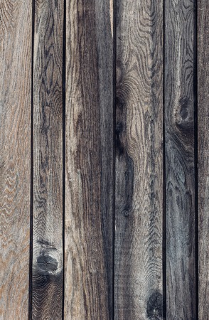 Vertical texture of old wooden planks as backgroundの写真素材