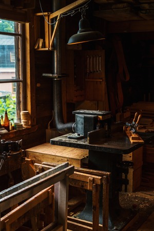 old carpenter's tools for working with wood workshopの写真素材