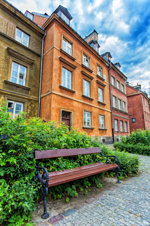 Elegant bench near the house, sunny day, calm place in Warsaw, Polandの写真素材