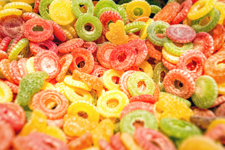 Salt colorful neon gummy candies for background useの写真素材