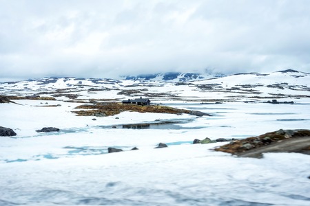 Norway mountain landscape with snow at summerの写真素材