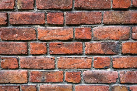 Background of old vintage red brick wallの写真素材
