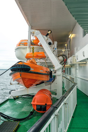 Lifeboat on deck of a cruise ship ferryの写真素材