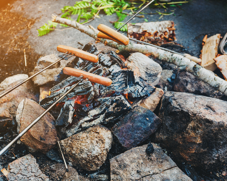 Big sausages barbecue at the stake. Hikeの写真素材