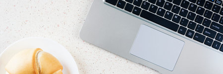 butter croissant and silver laptop in the table horizontal panorama