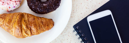 work table with apple break letters smartphone and sweets panorama, panoramic, horizontal
