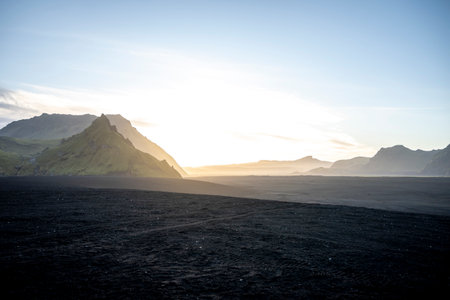 Icelandic landscape with mountains and fjords at sunset.の写真素材