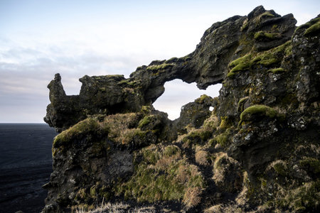 Icelandic rock formation on the Atlantic Ocean coast near Vik, Iceland