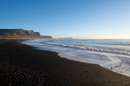 Black sand beach at Reynisfjara, Iceland. Atlantic ocean.の写真素材