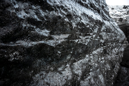 Black and white stone texture background. Close up of black and white rock.