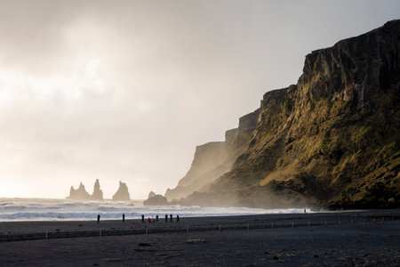 Foggy sunrise at Reynisfjara Beach, Iceland.の写真素材