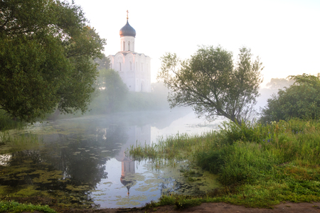 The Church of the Intercession on the Nerl, sunrise and fog. Vladimir Region, Bogolyubovo. Golden Ring of Russiaの写真素材