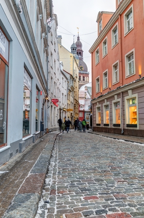 Riga, Latvia - January 5, 2019: Streets of the Old Town in Riga. Walk through the city streets.のeditorial素材