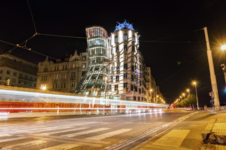 Prague, Czech Republic, April 22, 2019 - Dancing house in the evening, the lights of cars.のeditorial素材