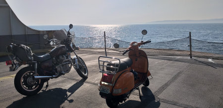 Two scooters parked on the pier.の写真素材