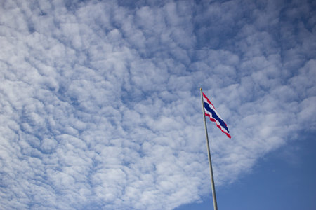 Thai flag on blue skyの写真素材