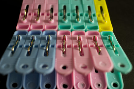 plastic clothespin on black background, Equipment for Housework