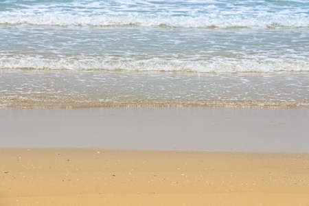 Sea wave on the sand beach - Abstract natural backgroundの写真素材