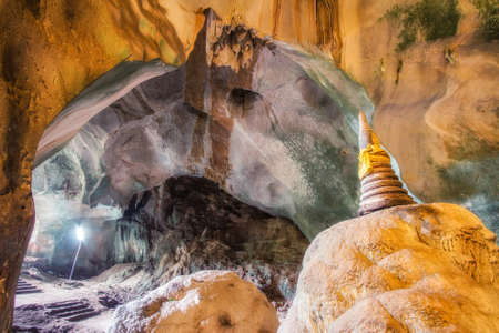 Amazing view of Buddhist Pagoda at the cave in temple of Thailandの写真素材