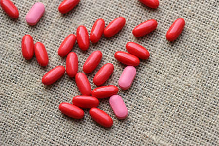 Medicine set - Pills and tablets in sackcloth backgroundの写真素材