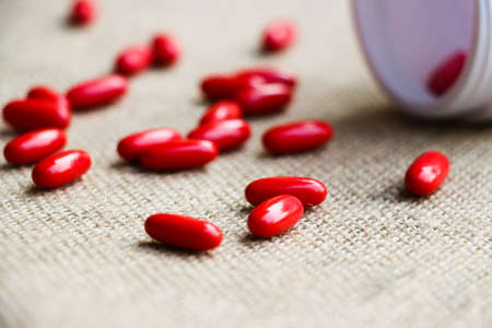 Medicine set - Pills and red tablets with white medicine boxの写真素材