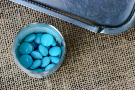 Heap of pills in the medicine box with stainless plate - Soft focus of Medicineの写真素材