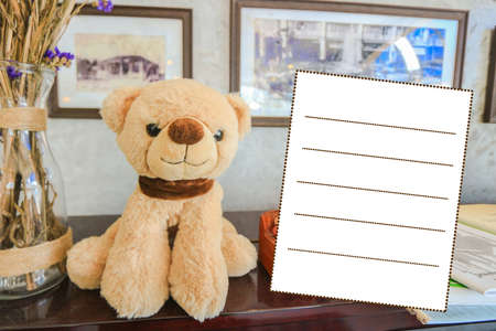 Postcard, bear doll and blank text box for write messageの写真素材