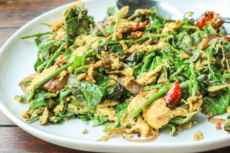 Liang leaves fried with eggs, delicious fried vegetable of thai southern food, Isolated  picture of foodの写真素材