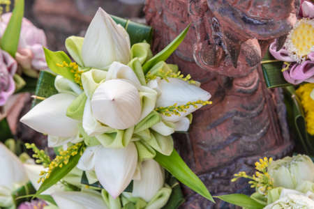 Beautiful lotus flowers for pay respect to Buddha from traditional Thai styleの写真素材
