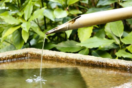 Water falling in a fountainの写真素材