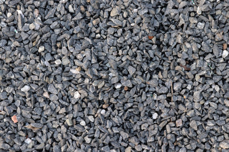 Close-up of black and white gravel abstract textured backgroundの写真素材