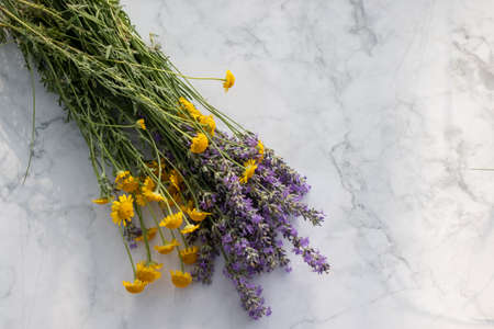 Bouquet of lavender and wildflowersle backgroundの写真素材