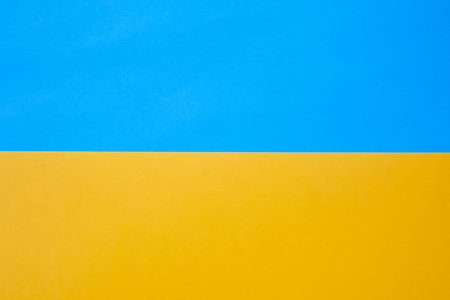 Yellow and blue paper texture. Flag of Ukraine made of colored paper. Independence day blank...