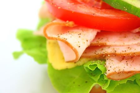 Fresh sandwich with ham and cheese and vegetablesの写真素材