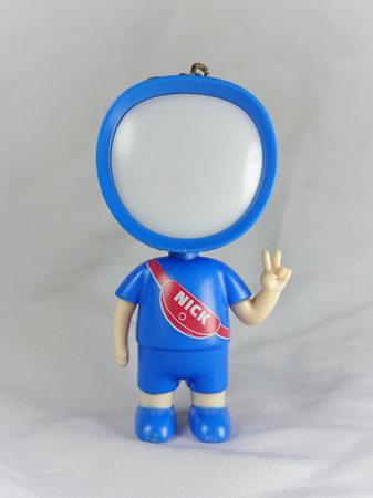 Plasticine man with a sign for sale on a white backgroundの写真素材