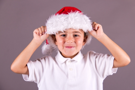 Little boy with Santa hatの写真素材