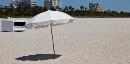 Sun umbrellas on a sandy beachの写真素材