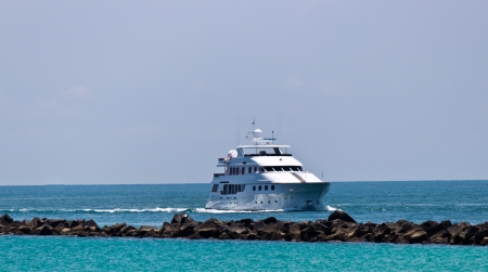 Luxury yatch coming into portの写真素材