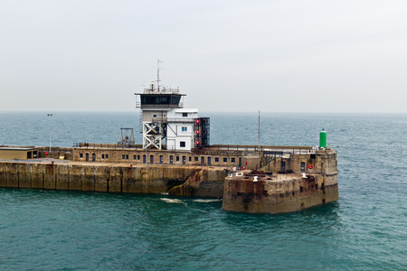 Man-made breakwater structure at port entranceの写真素材